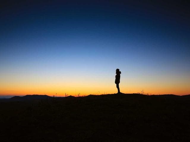 Mountain ultra runner on ridge